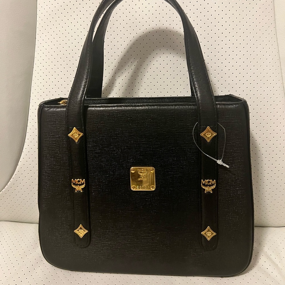 MCM Germany Black Leather Handbag with gold accents